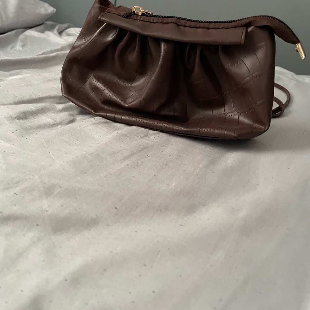 Brown hand purse